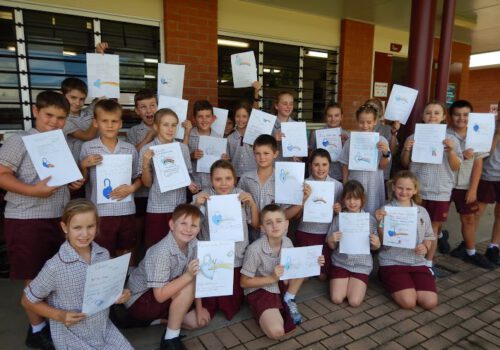 Class holding posters